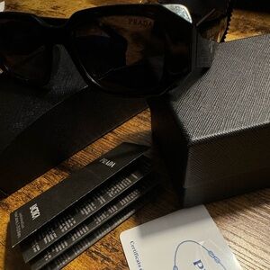 Pre-own Prada sunglasses perfect condition with receipt